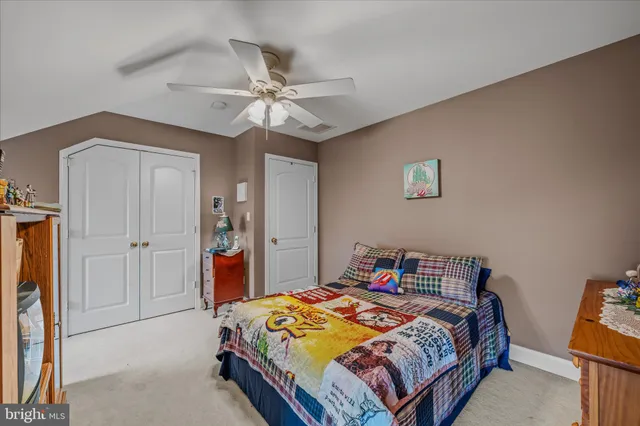 a view of a patio with a table and chairs