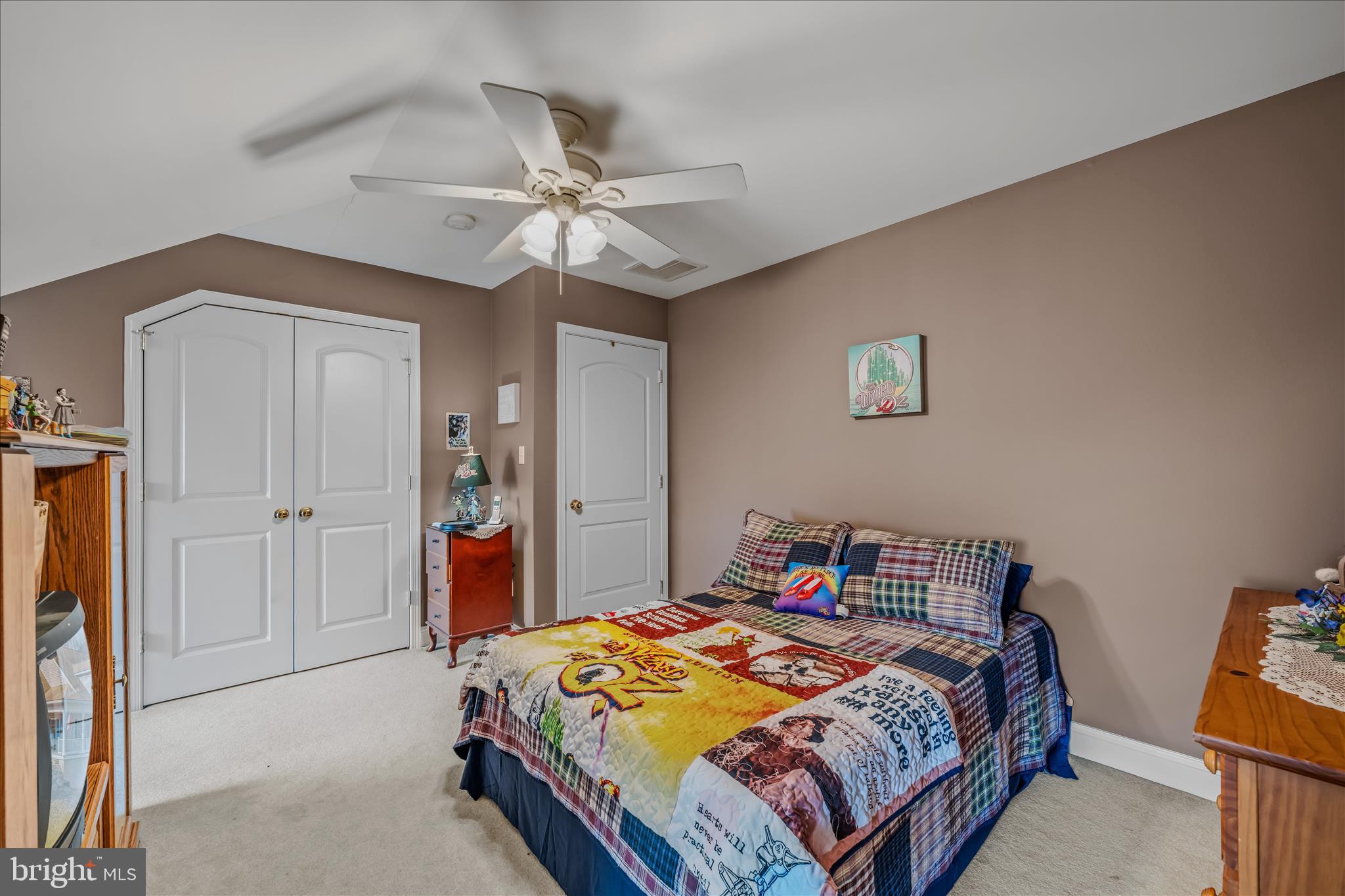 7020 Debold Road Thurmont, MD 21788 - Photo 51 of 83 a bedroom with a bed and a chandelier