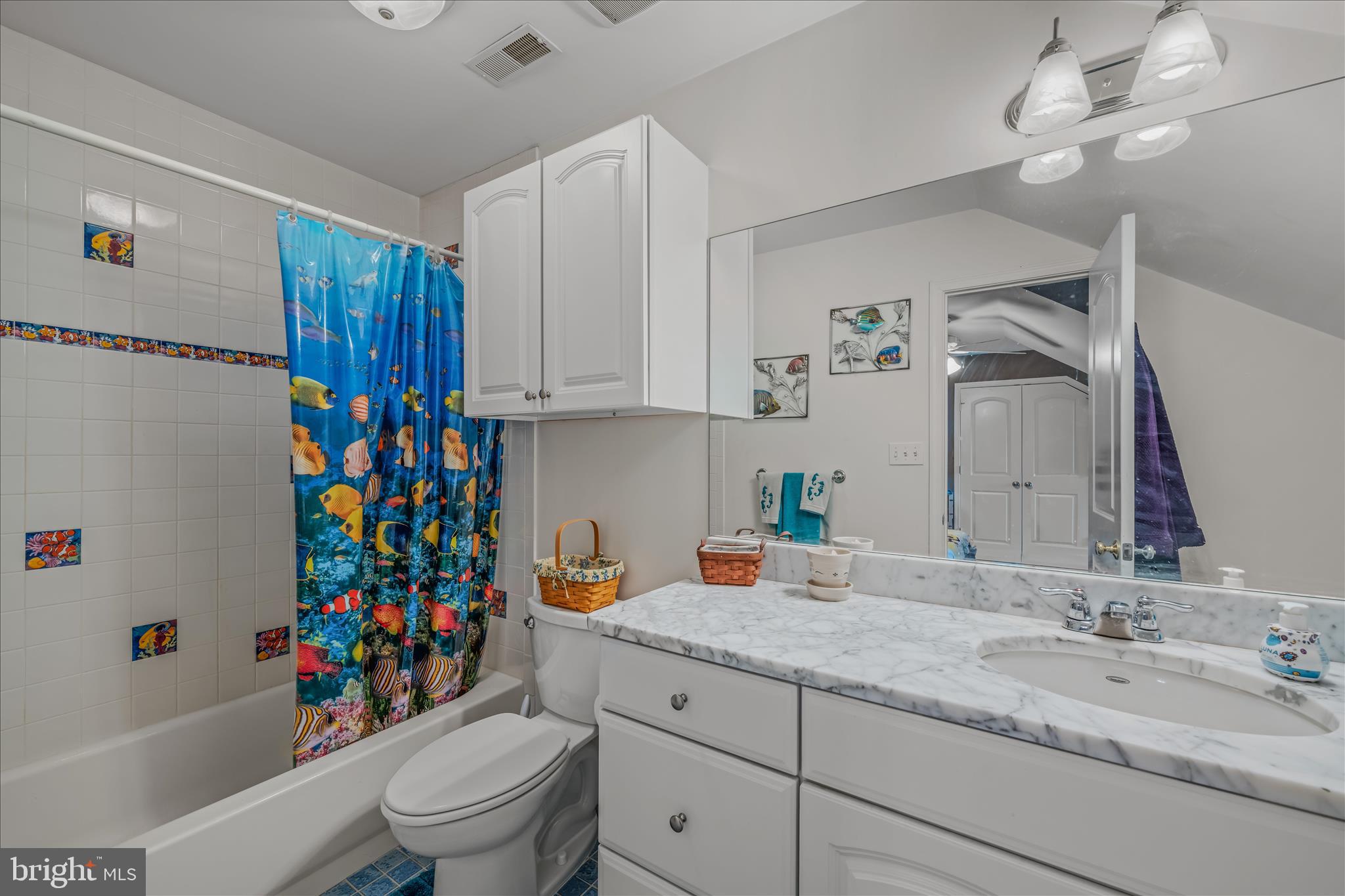 7020 Debold Road Thurmont, MD 21788 - Photo 52 of 83 a bathroom with a sink a toilet tub and shower