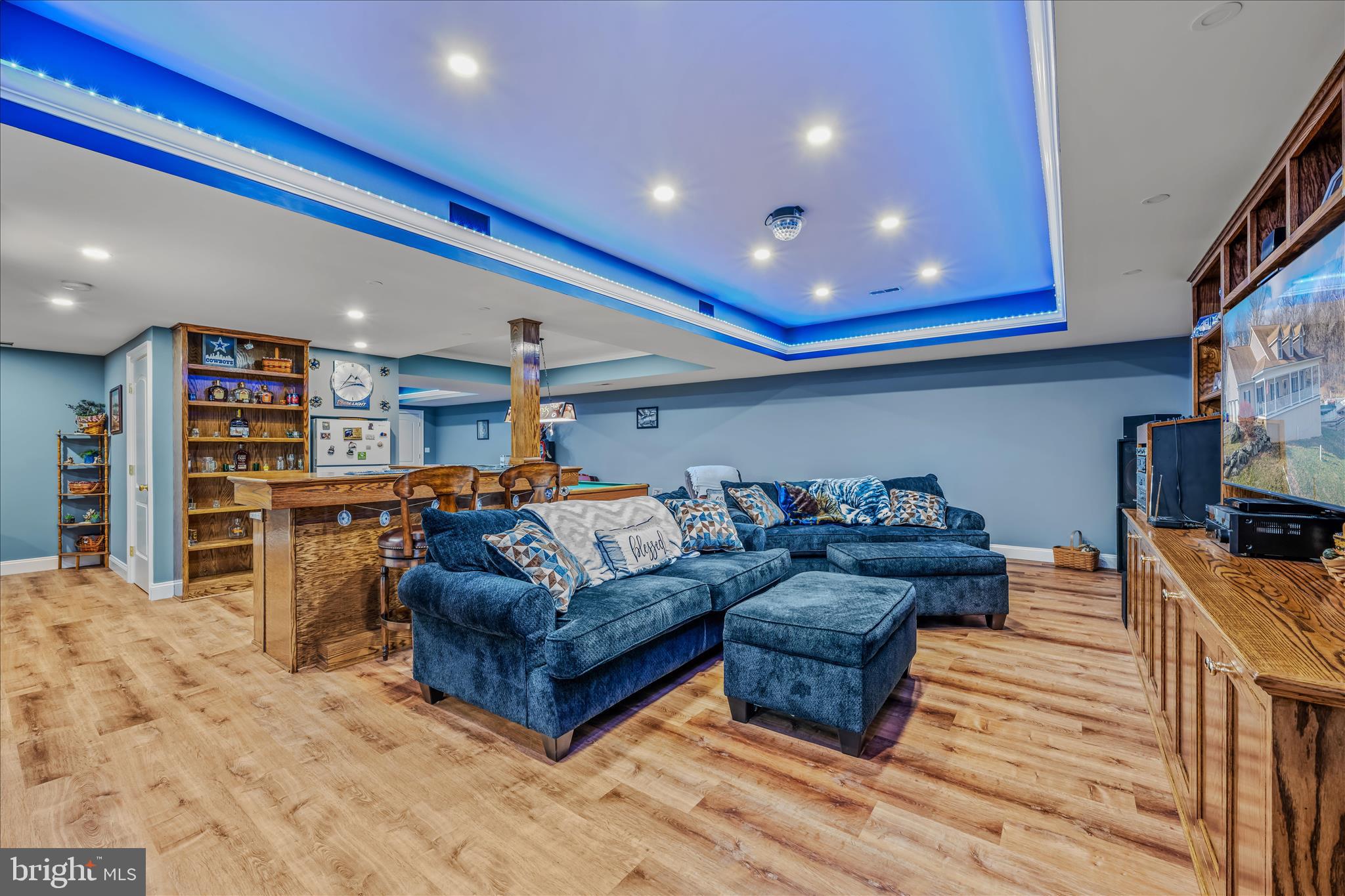 7020 Debold Road Thurmont, MD 21788 - Photo 58 of 83 a living room with furniture and a flat screen tv