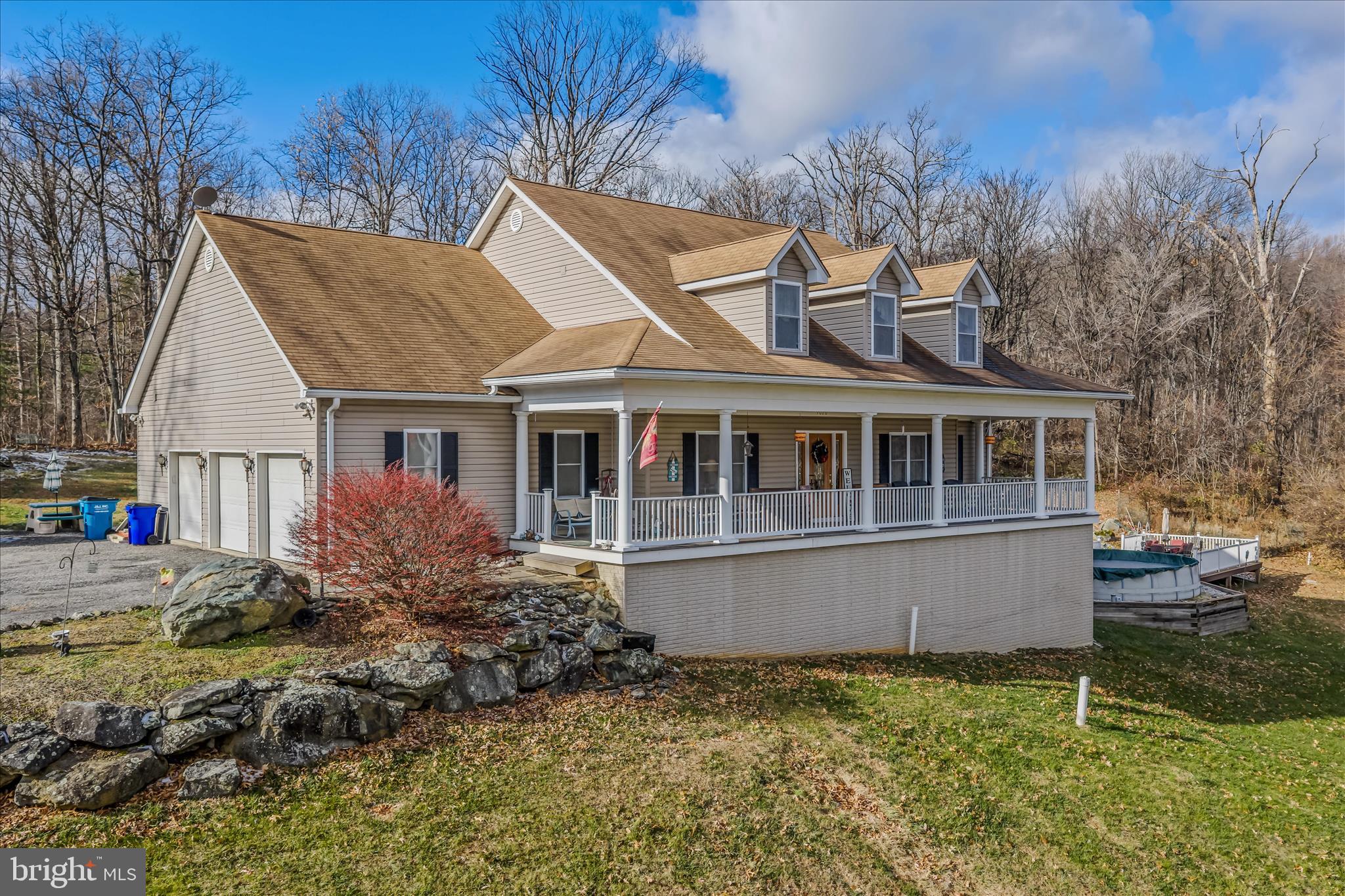 7020 Debold Road Thurmont, MD 21788 - Photo 6 of 83 a front view of house with yard and trees around