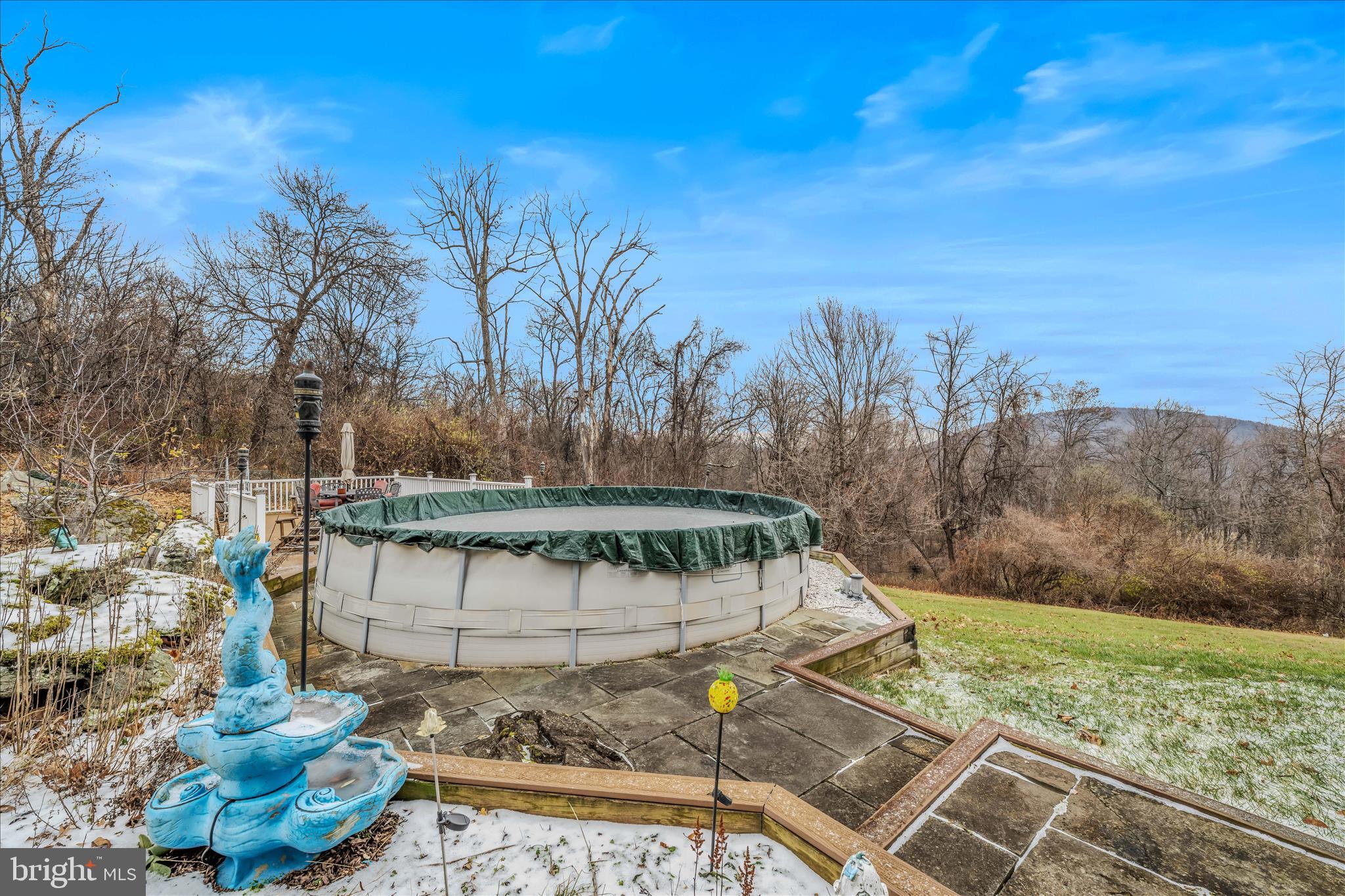 7020 Debold Road Thurmont, MD 21788 - Photo 69 of 83 a view of a backyard with sitting area