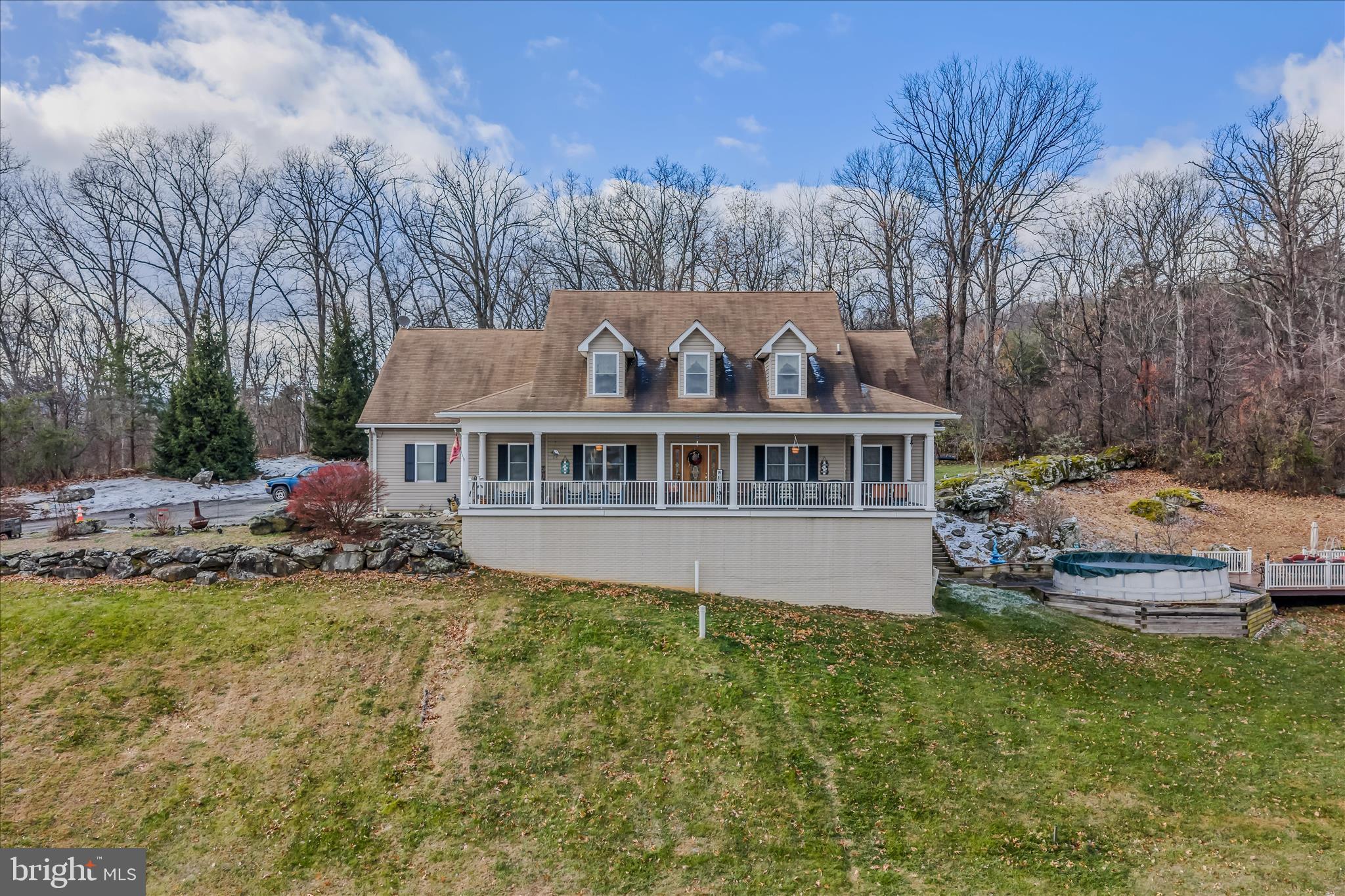 7020 Debold Road Thurmont, MD 21788 - Photo 76 of 83 a front view of a house with a garden