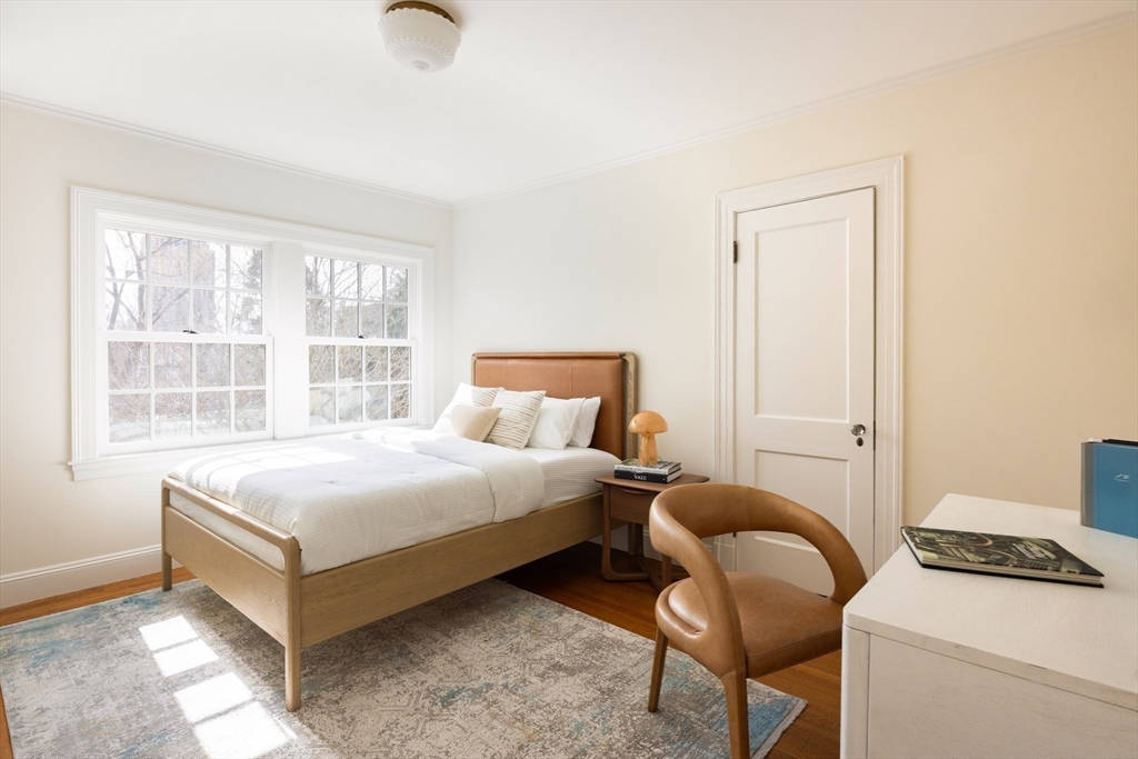 15 Hubbard Park Road Cambridge, MA 02138 - Photo 21 of 31 a bedroom with a bed and a window