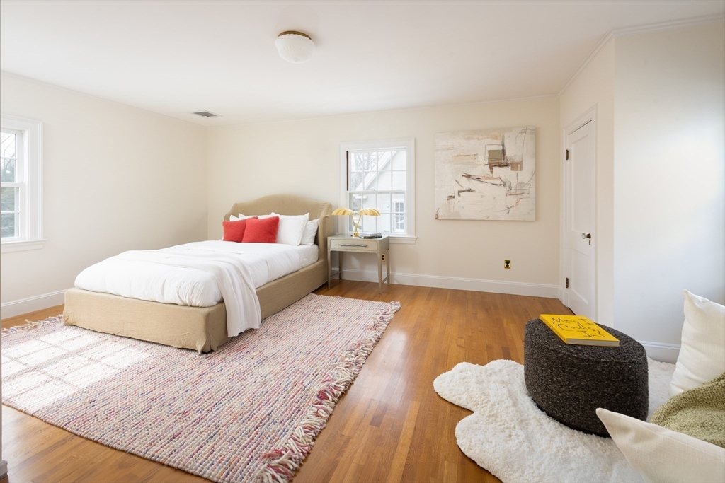 15 Hubbard Park Road Cambridge, MA 02138 - Photo 23 of 31 a spacious bedroom with a bed and window