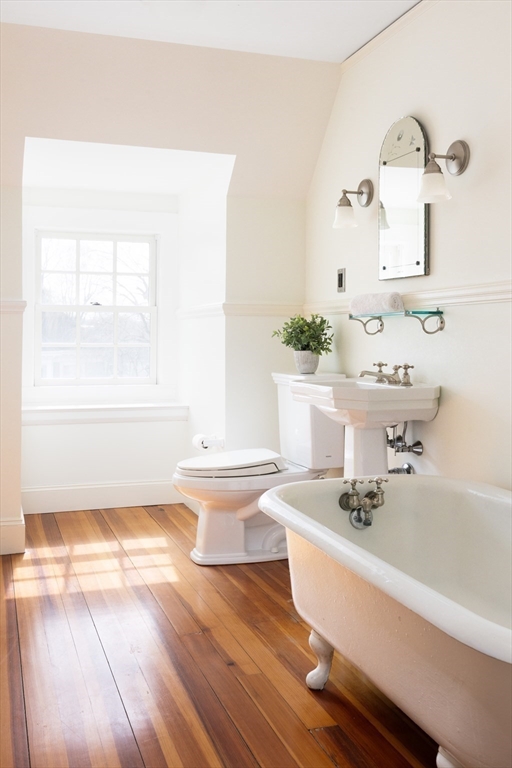15 Hubbard Park Road Cambridge, MA 02138 - Photo 26 of 31 a bathroom with a sink and a large mirror