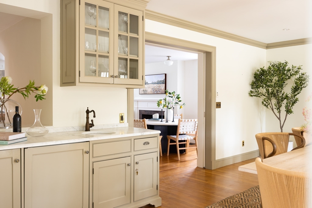 15 Hubbard Park Road Cambridge, MA 02138 - Photo 7 of 31 a kitchen with a sink a stove and cabinets