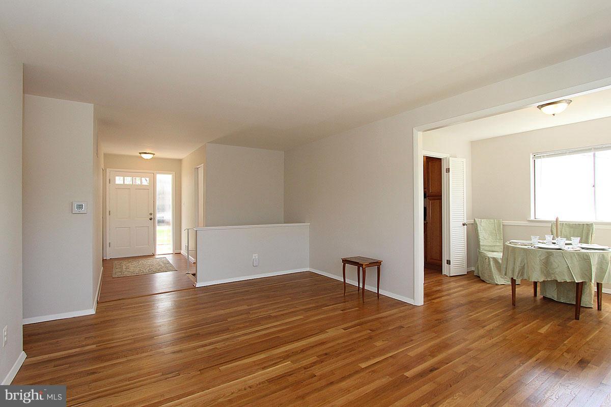 809 Harrington Road Rockville, MD 20852 - Photo 7 of 30 View Living Room Open to Dining & Foyer