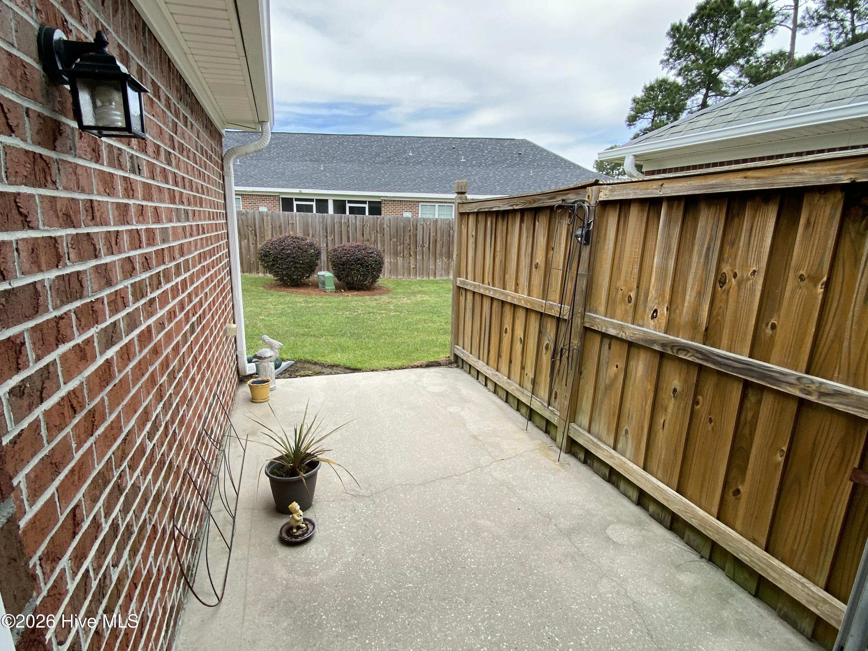 1041 Bridgeport Way Leland, NC 28451 - Photo 17 of 22 Back Patio