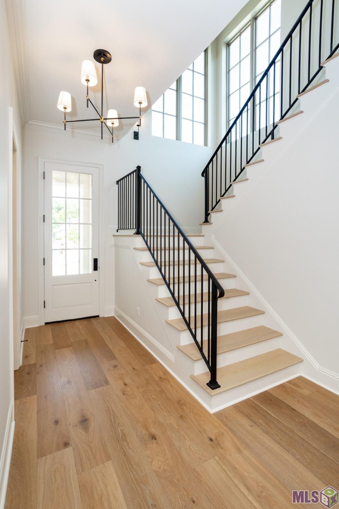 2127 Stableford Lane Baton Rouge, LA 70809 - Photo 2 of 46 Light Filled Foyer with Gorgeous Iron Staircase