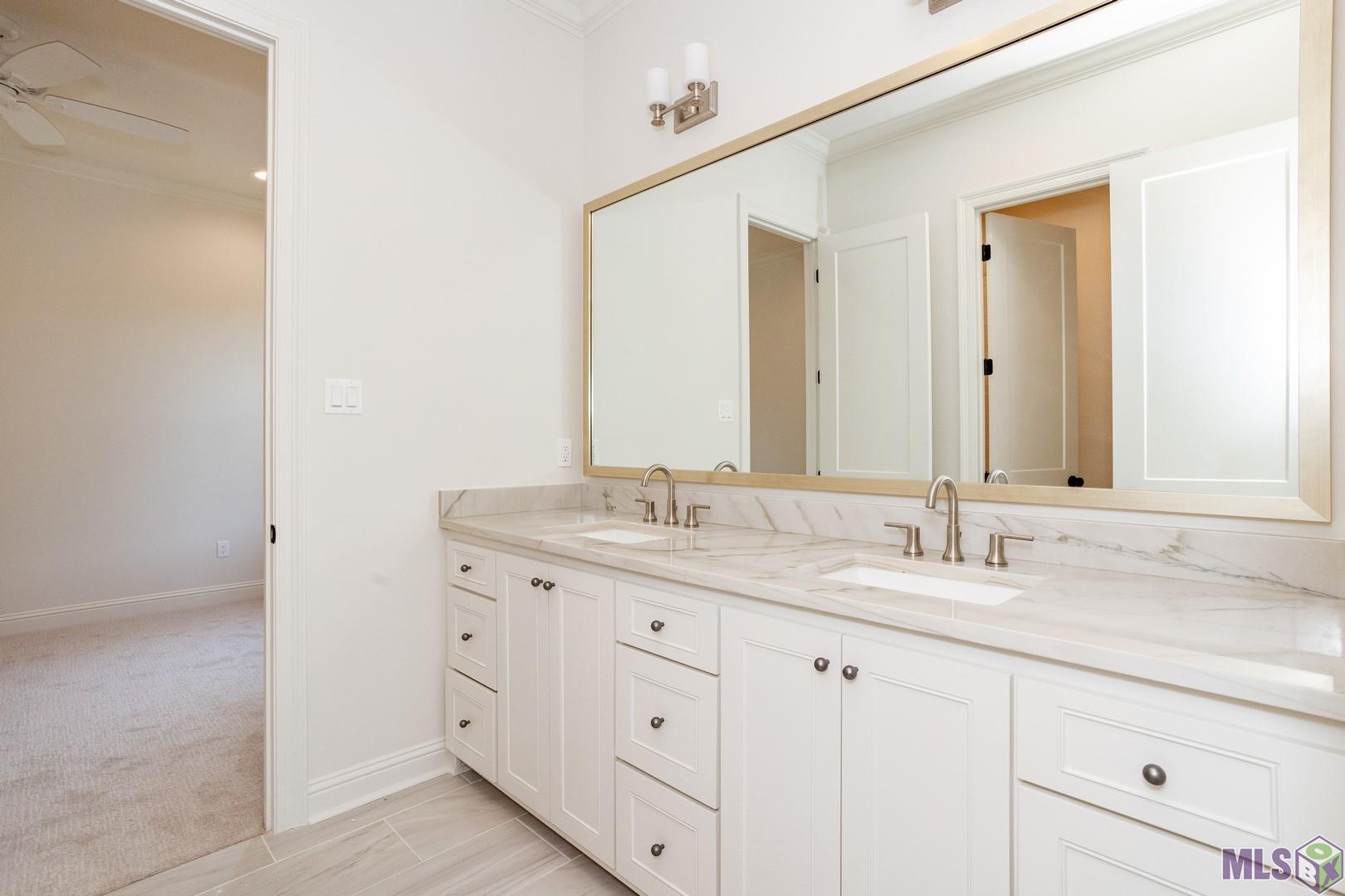 2127 Stableford Lane Baton Rouge, LA 70809 - Photo 36 of 46 Upstairs Bathroom with Tub and Toilet Separate from the Vanity
