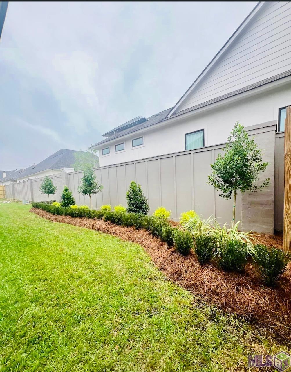 2127 Stableford Lane Baton Rouge, LA 70809 - Photo 45 of 46 Beautifully landscaped backyard