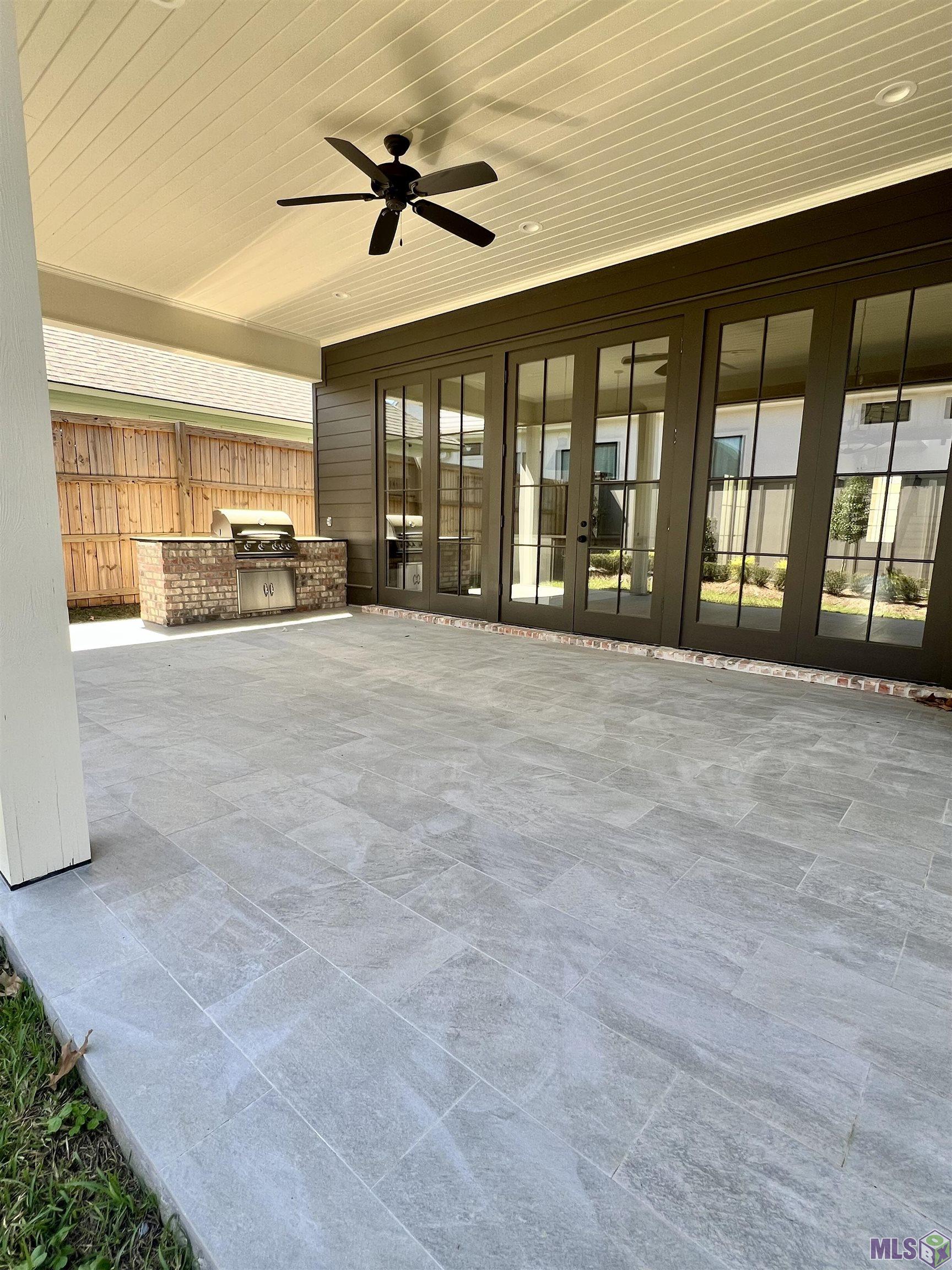 2127 Stableford Lane Baton Rouge, LA 70809 - Photo 5 of 46 Large Inviting Tiled Covered Patio and Grill