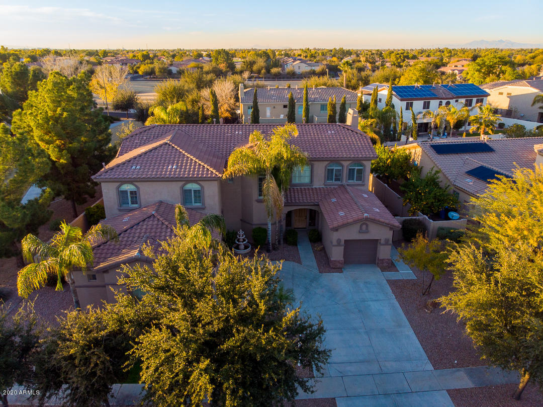 4640 East Reins Road Gilbert, AZ 85297 - Photo 102 of 122 a front view of a house with a yard outdoor seating
