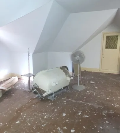 a view of a room with a window