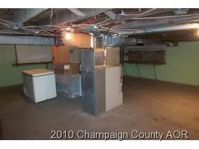 a kitchen with a refrigerator and a sink