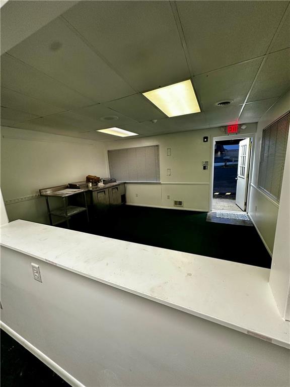 890 Pittsburgh Road, Unit 1 Butler, PA 16002 - Photo 14 of 16 a bathroom with a sink and a large mirror