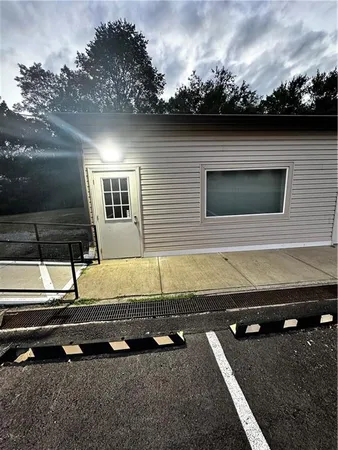 a view of a mini pool with a yard