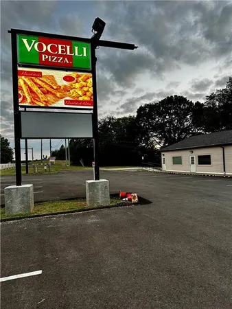 a view of building with sign board