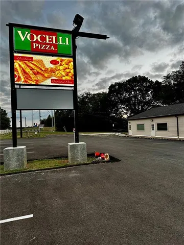 a view of building with sign board