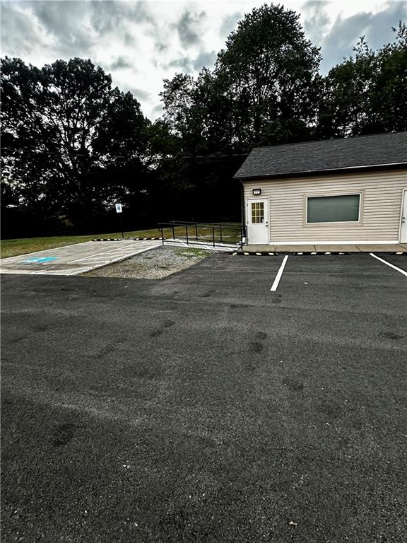 890 Pittsburgh Road, Unit 1 Butler, PA 16002 - Photo 3 of 16 a front view of a house with a yard