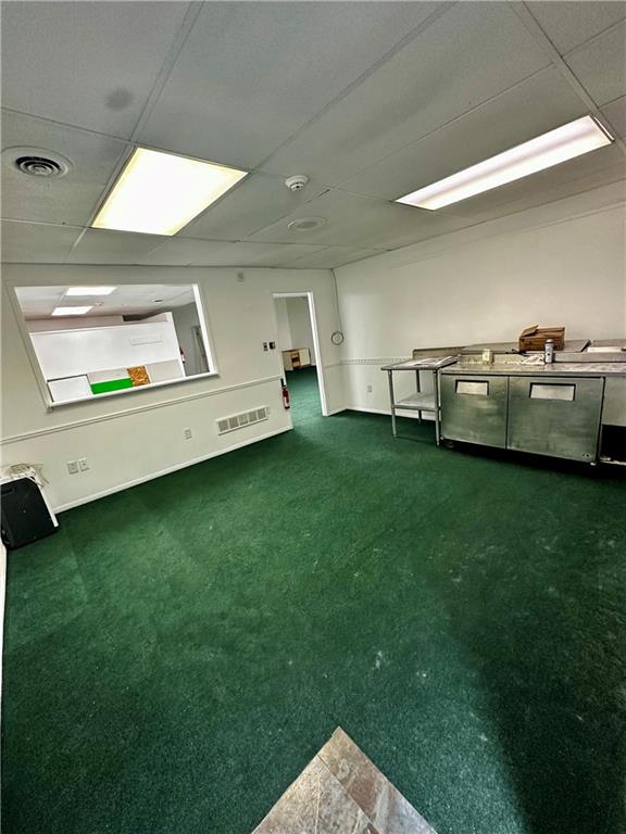 890 Pittsburgh Road, Unit 1 Butler, PA 16002 - Photo 5 of 16 a view of a backyard with table and chairs