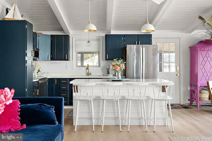 11165 Roland Parks Road Deal Island, MD 21821 - Photo 5 of 19 Chic coastal kitchen with vibrant accents.