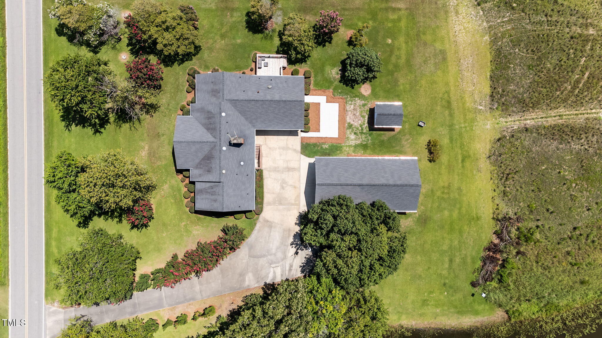 919 Drag Strip Road Benson, NC 27504 - Photo 9 of 54 an aerial view of a house with a yard