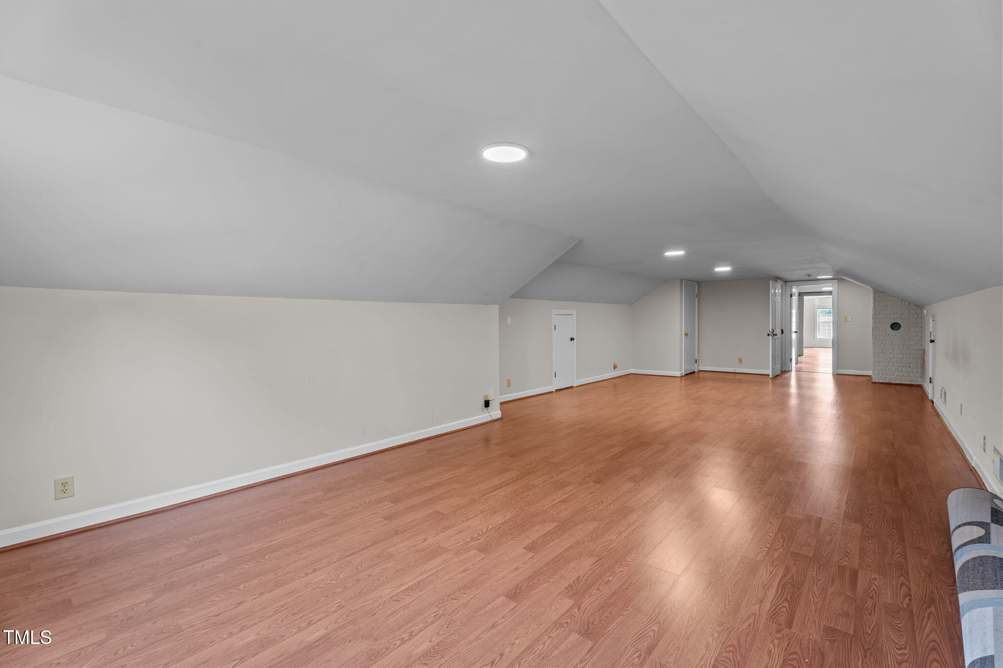 919 Drag Strip Road Benson, NC 27504 - Photo 29 of 54 a view of empty room with wooden floor