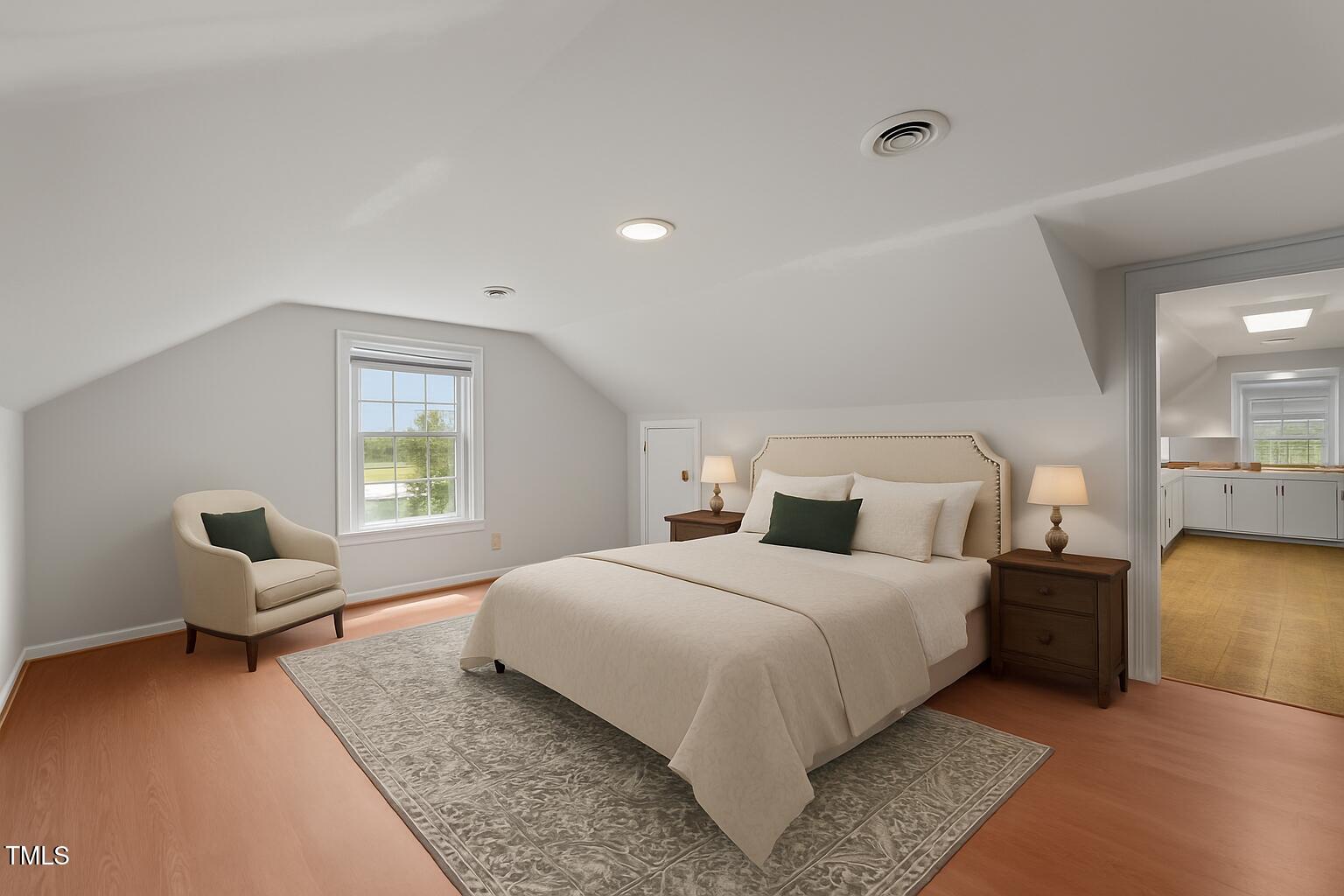 919 Drag Strip Road Benson, NC 27504 - Photo 30 of 54 a bedroom with a bed and window