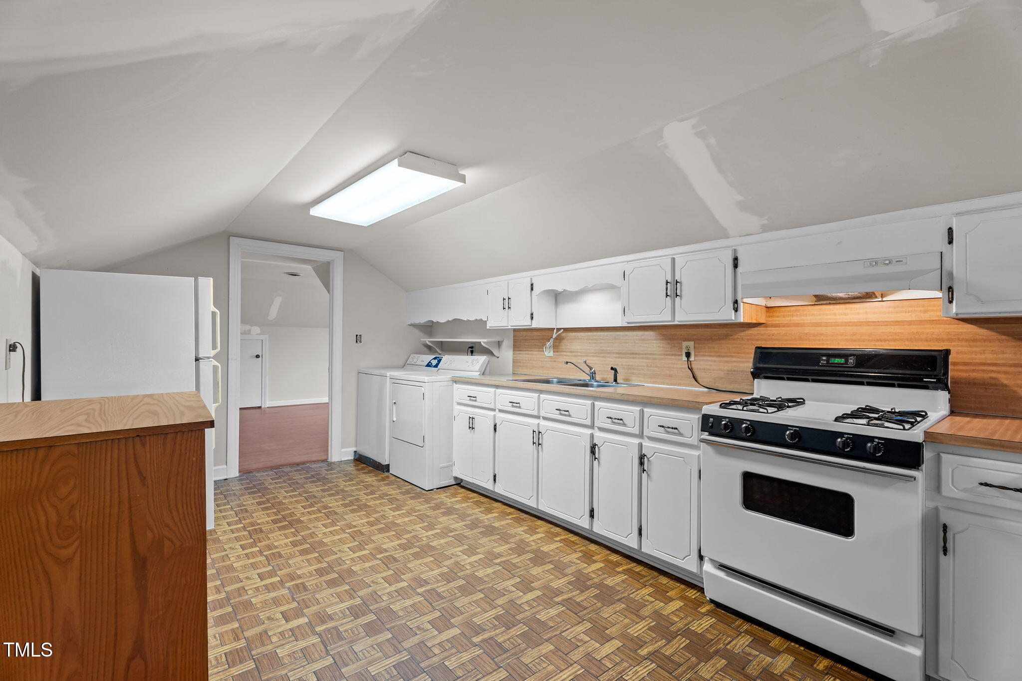 919 Drag Strip Road Benson, NC 27504 - Photo 34 of 54 2nd Floor Kitchen & Laundry