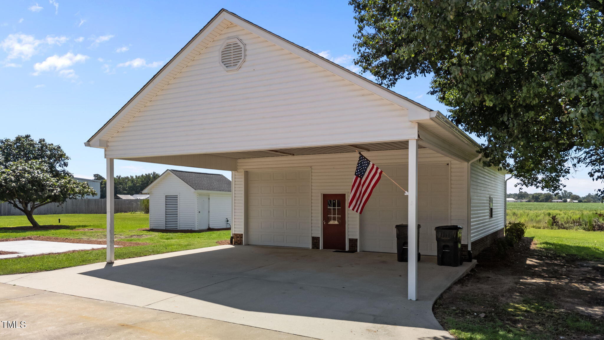 919 Drag Strip Road Benson, NC 27504 - Photo 6 of 54 a view of a house with backyard and trees