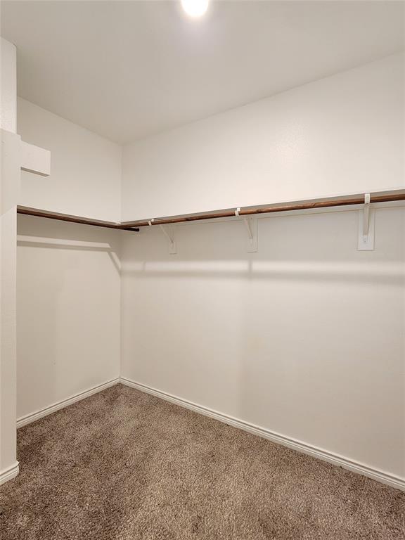 2124 Hobby Drive Forney, TX 75126 - Photo 34 of 40 Master walk-in closet off bathroom