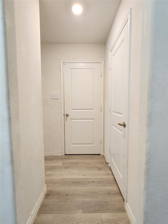 2124 Hobby Drive Forney, TX 75126 - Photo 4 of 40 Front hallway to garage and utility room