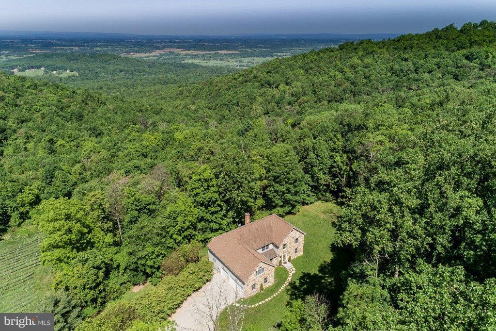 17991 Raven Rocks Road Bluemont, VA 20135 - Photo 2 of 30 an aerial view of a house with a yard