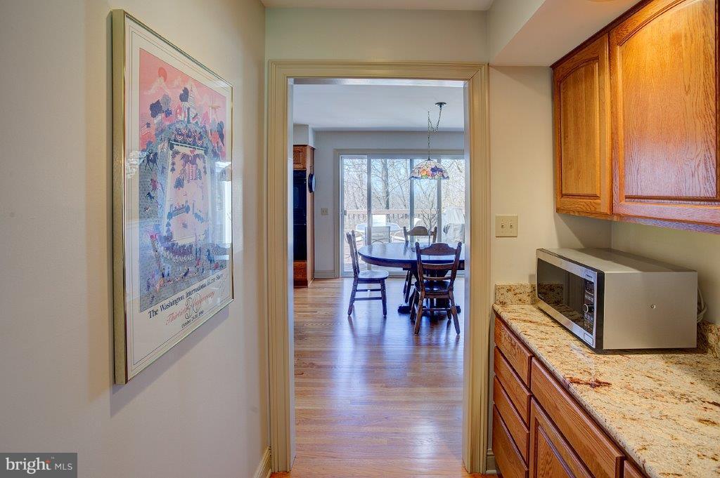 17991 Raven Rocks Road Bluemont, VA 20135 - Photo 12 of 30 a view of a kitchen with workspace and wooden floor