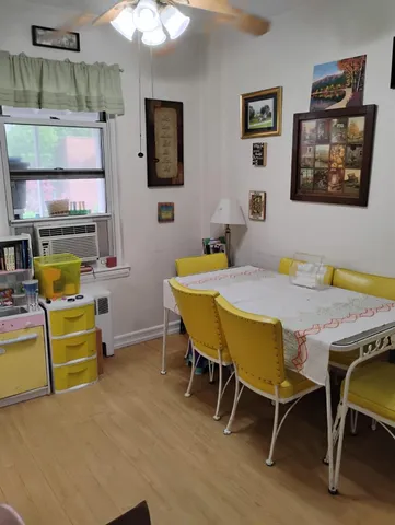 a view of a dining room with furniture