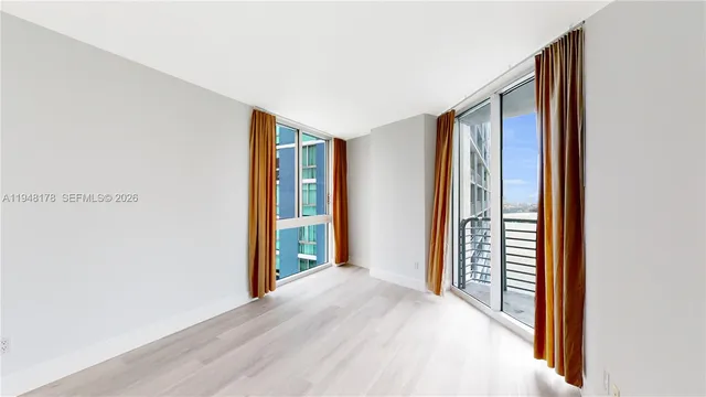 a view of entryway with wooden floor