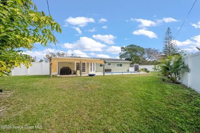 a front view of house with yard and entertaining space