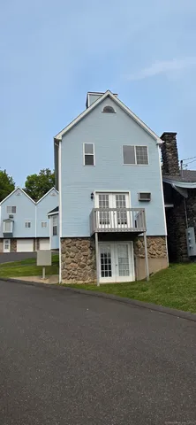 a view of house with outdoor space