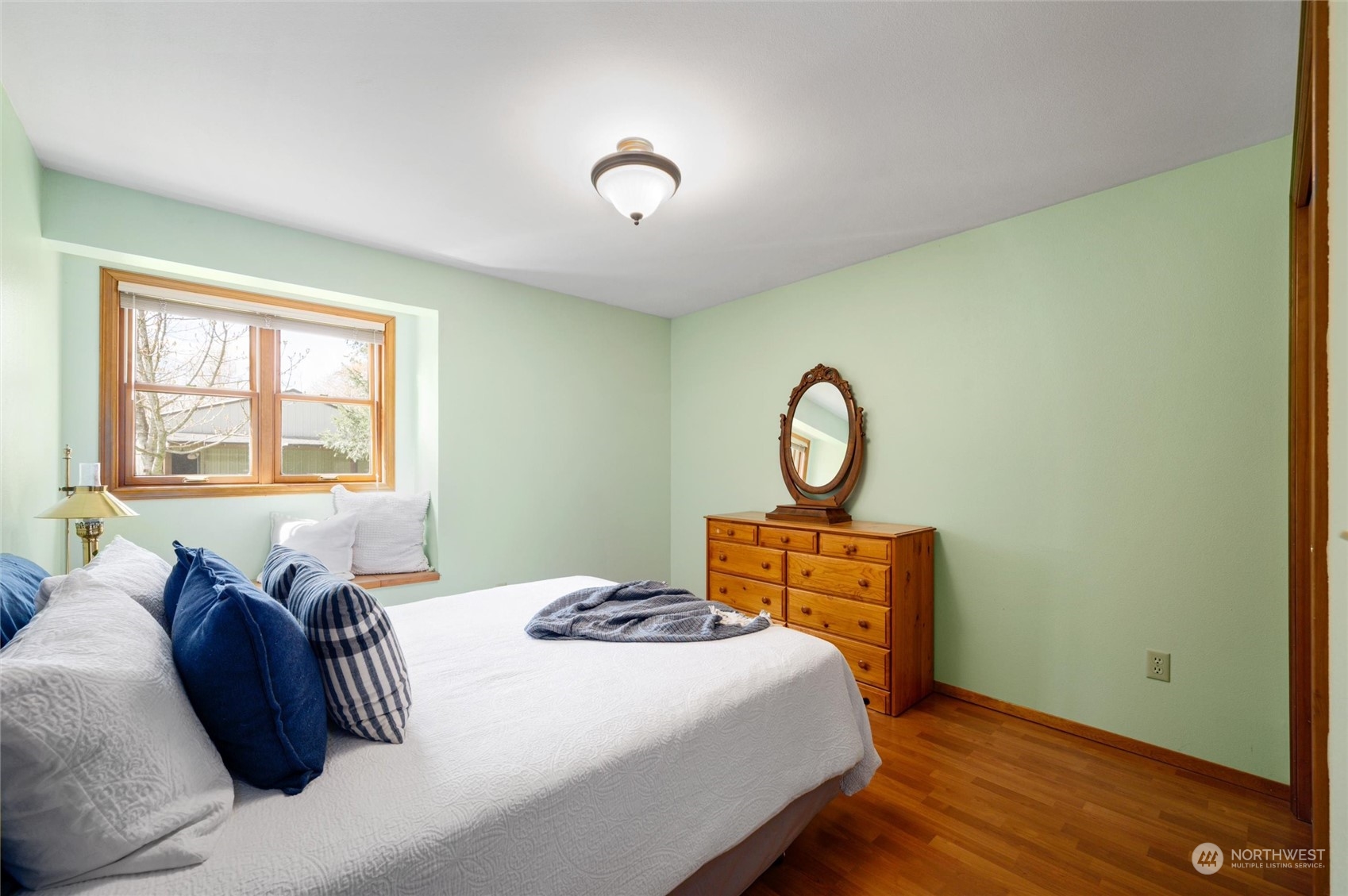 6002 Aldrich Road Bellingham, WA 98226 - Photo 13 of 30 a bedroom with a bed and a window