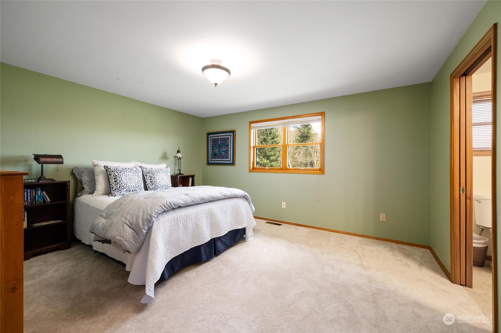 6002 Aldrich Road Bellingham, WA 98226 - Photo 10 of 30 a spacious bedroom with a bed and a window