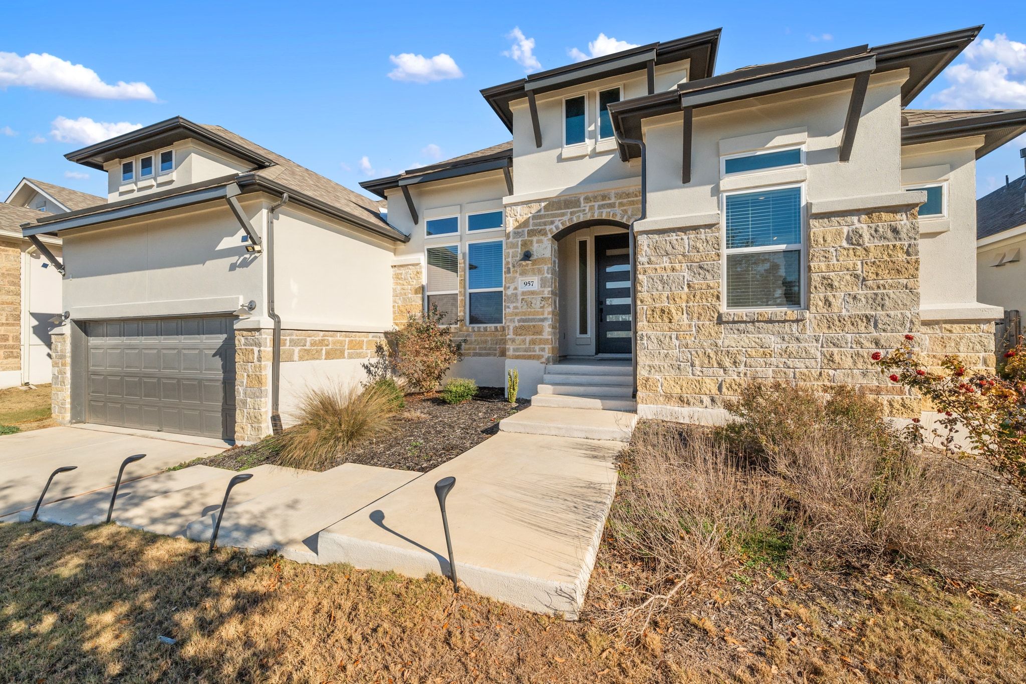 957 Arrowhead Ranch Boulevard Dripping Springs, TX 78620 - Photo 1 of 31 Welcome to 957 Arrowhead Ranch Blvd.!