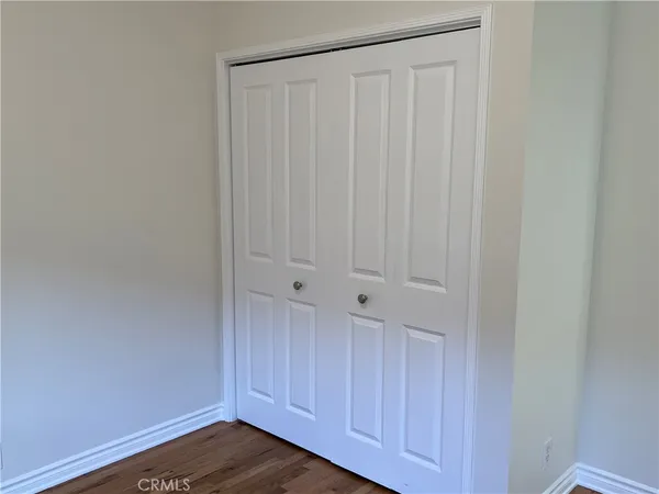 a view of a wooden closet