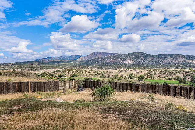a view of a lake with a city