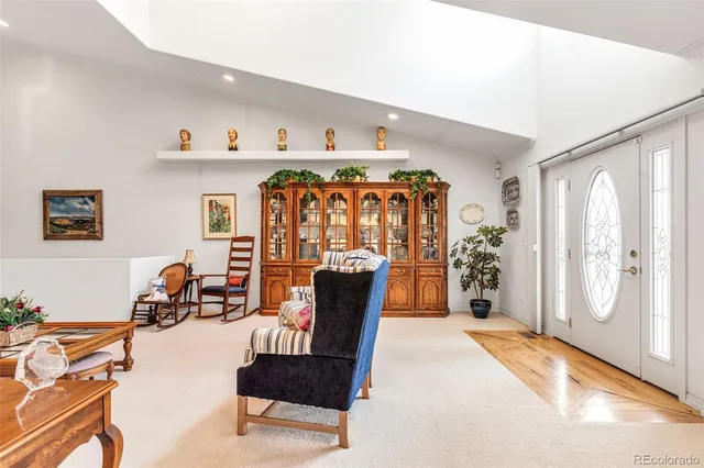 a view of a livingroom with furniture and windows