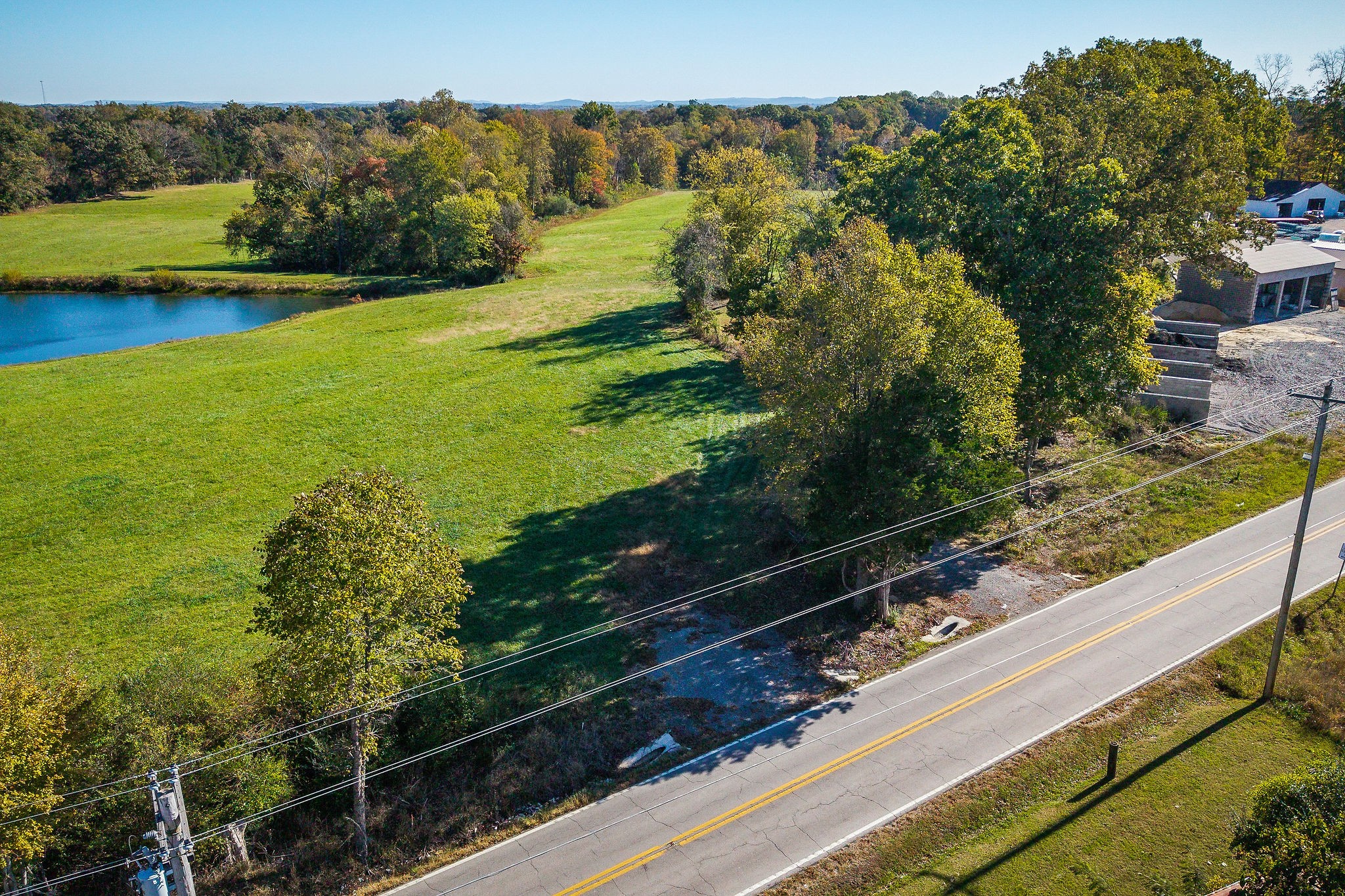 0 Bloomington Road Bloomington Springs, TN 38545 - Photo 10 of 12 a view of a lake with a yard