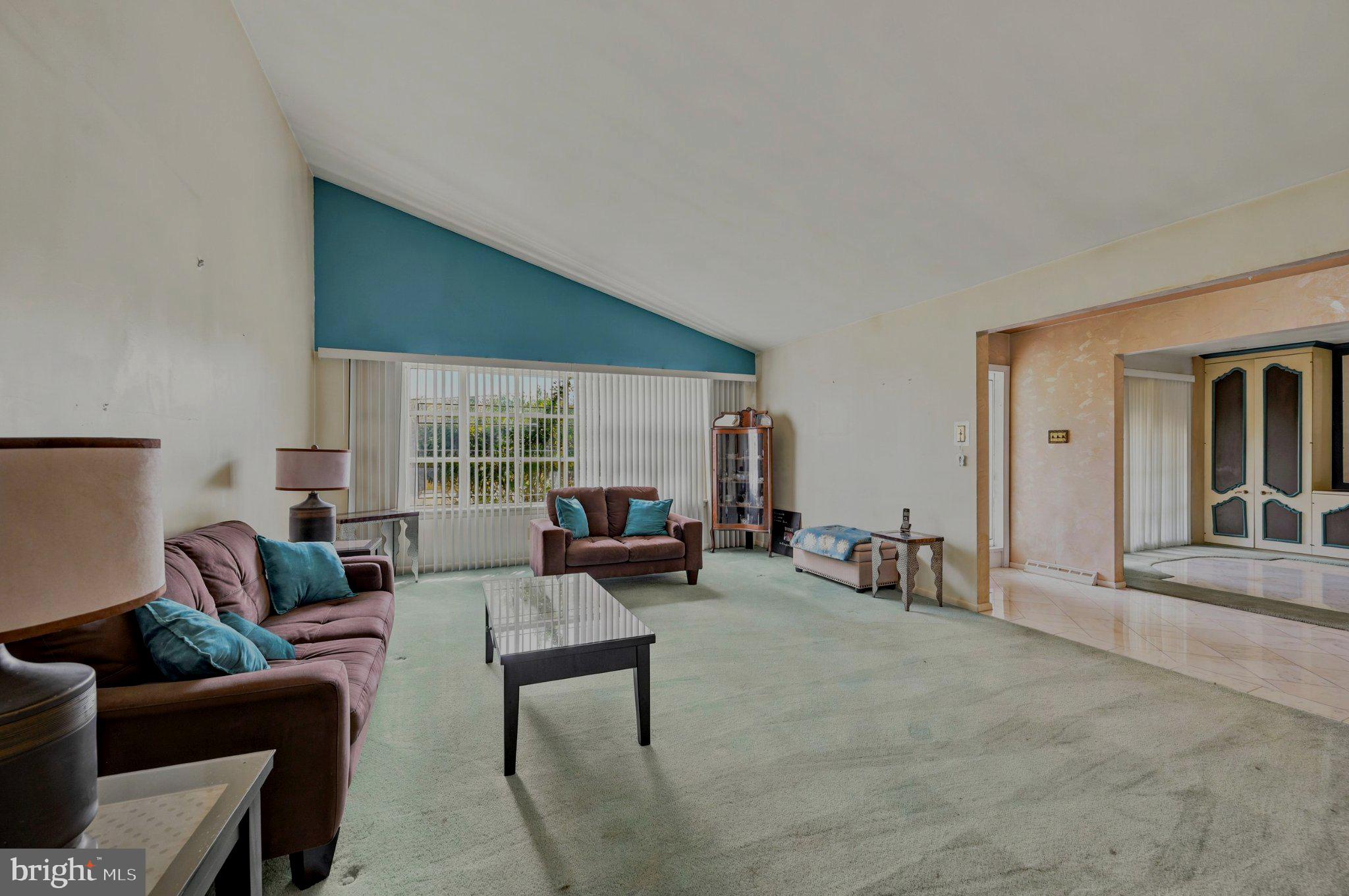 7900 Deer Run Road Glenside, PA 19038 - Photo 1 of 17 Spacious living area with vaulted ceiling.
