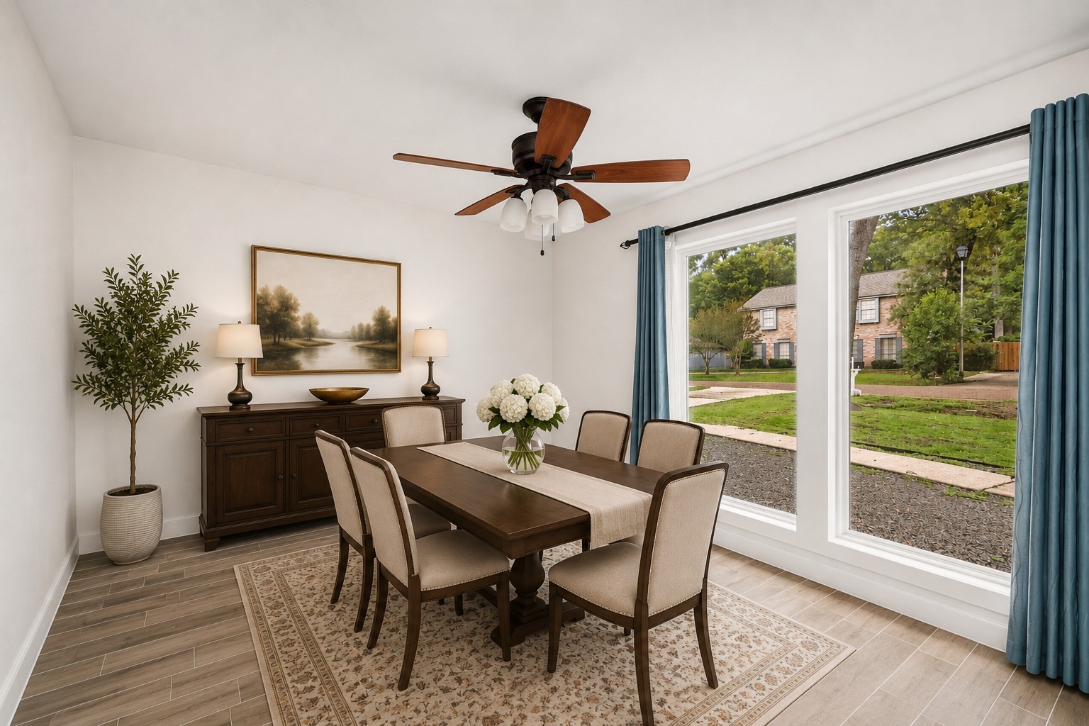 560 Landfall Lane Conroe, TX 77302 - Photo 3 of 41 Formal dining room with abundant natural light and elegant entertaining space.