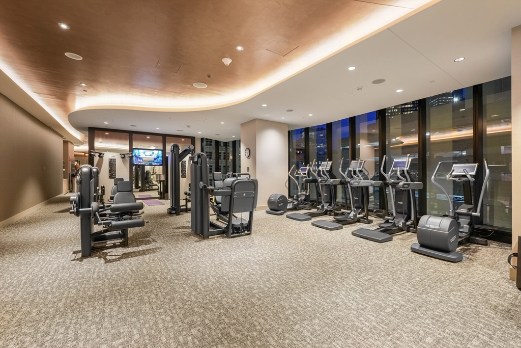 1 Franklin Street, Unit 1709 Boston, MA 02110 - Photo 16 of 17 a view of a room with gym equipment